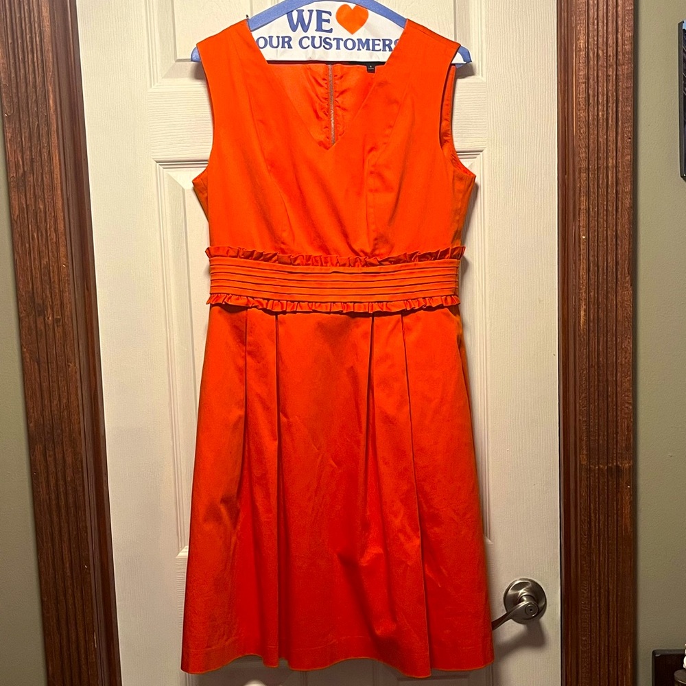 Sleeveless, fit and flare orange Alex and Marie dress